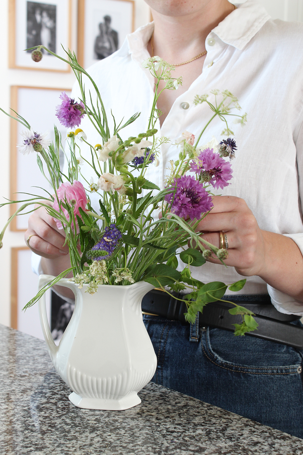 Ruby of Thyme On Our Hands arranging wildflowers in white ironstone pitcher