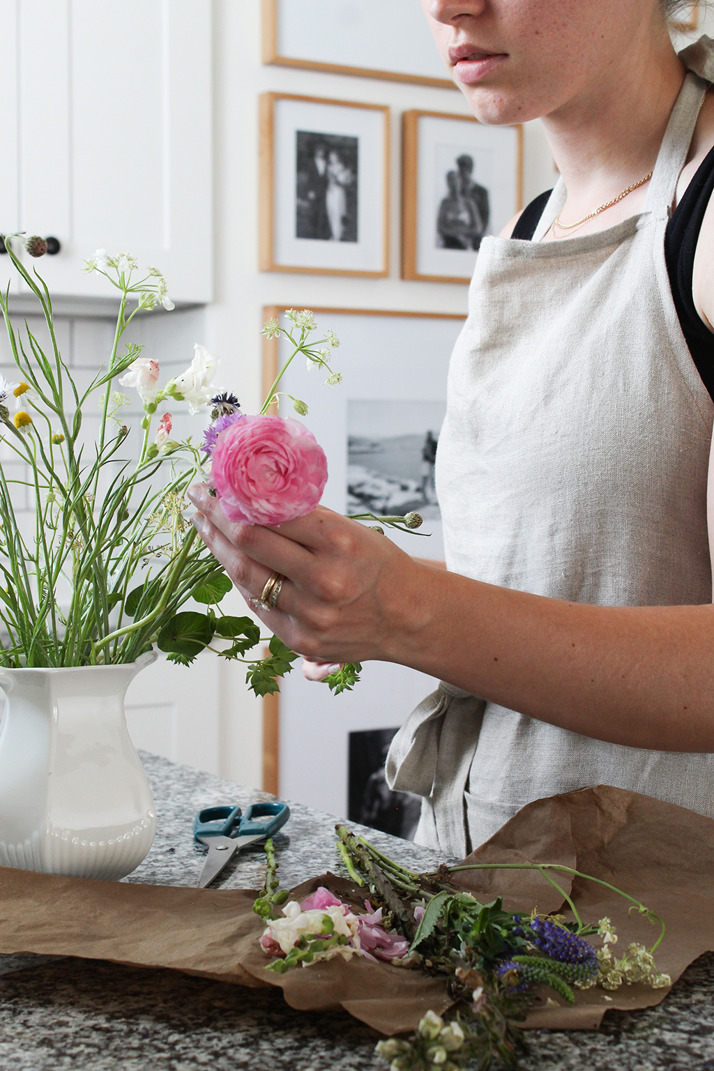 Ruby of Thyme On Our Hands arranging wildflowers in white ironstone pitcher
