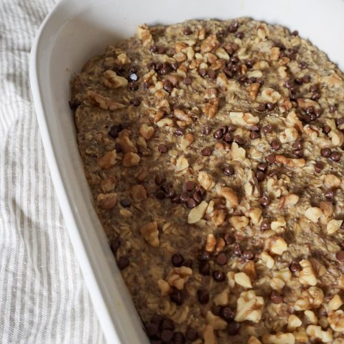 Freshly baked banana oatmeal in a ceramic baking dish
