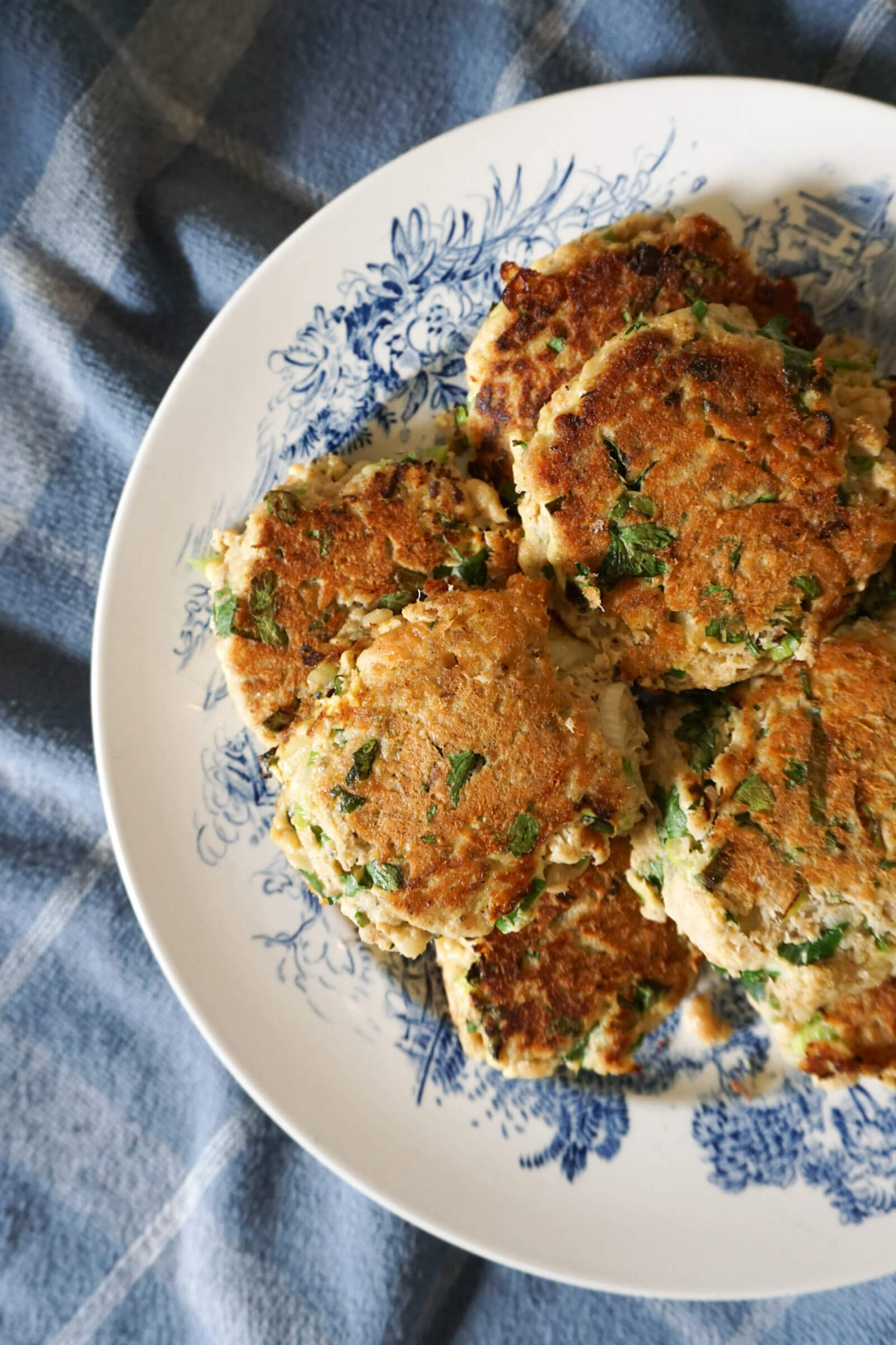 Plate of salmon patties made with canned salmon lemon and parsley
