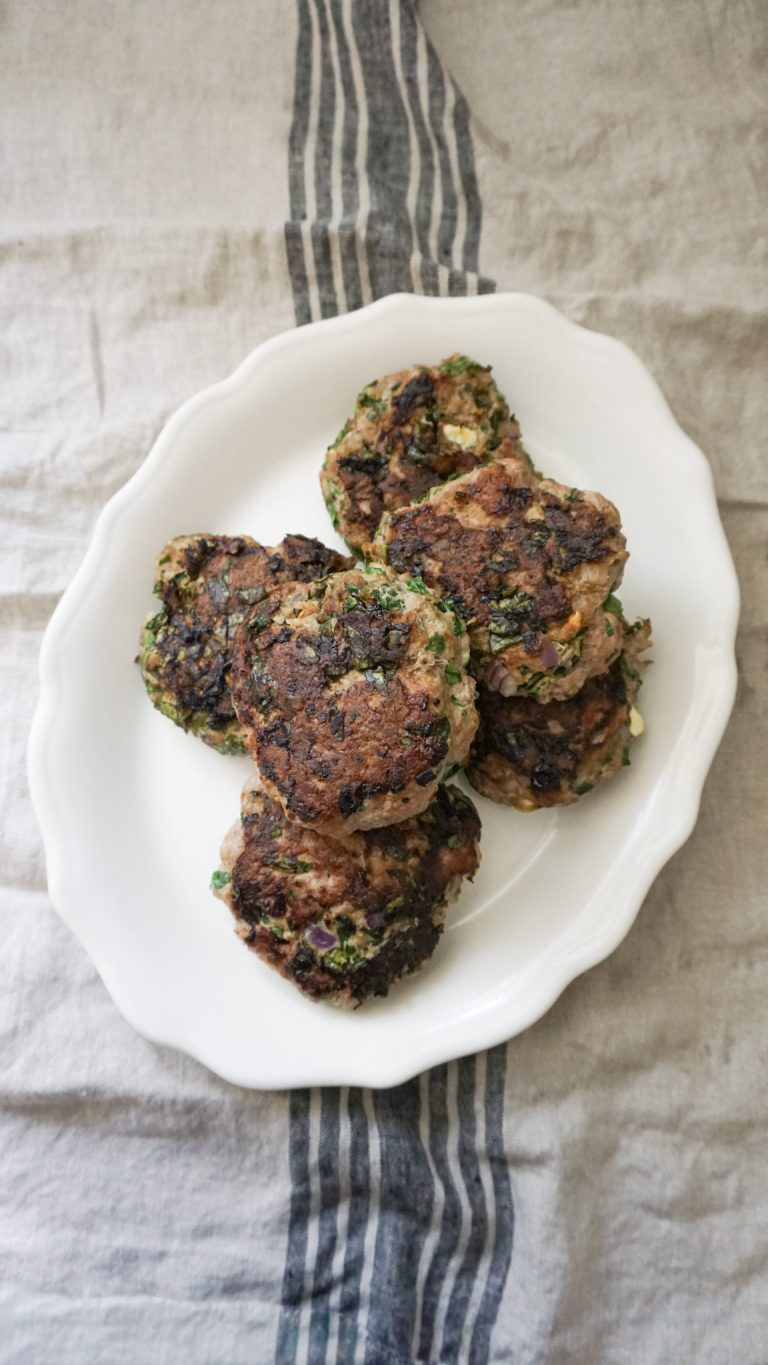 Healthy Greek turkey burger with feta served on a plate