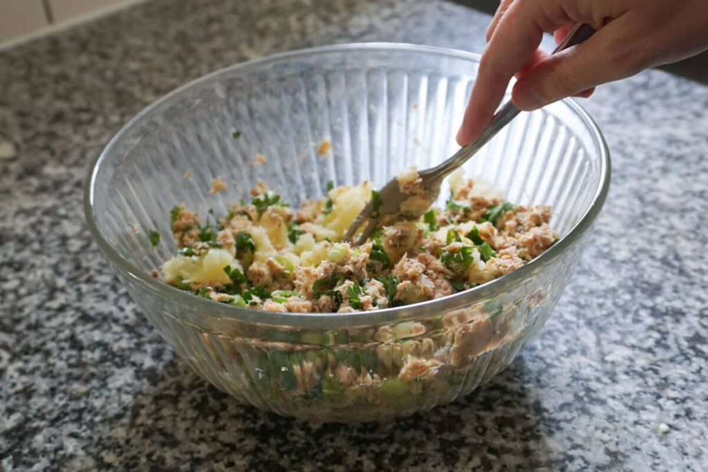 Mixing ingredients for salmon patties