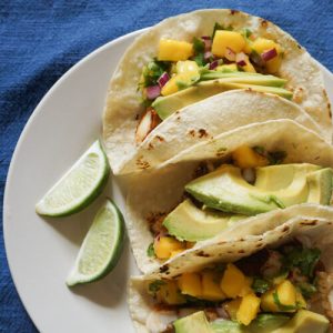 Baked blackened fish tacos served with mango salsa