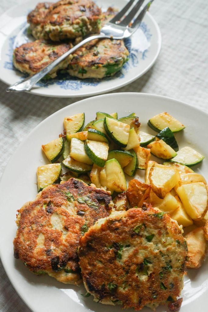 Salmon cakes with potatoes and sautéed zucchini for a budget summer meal