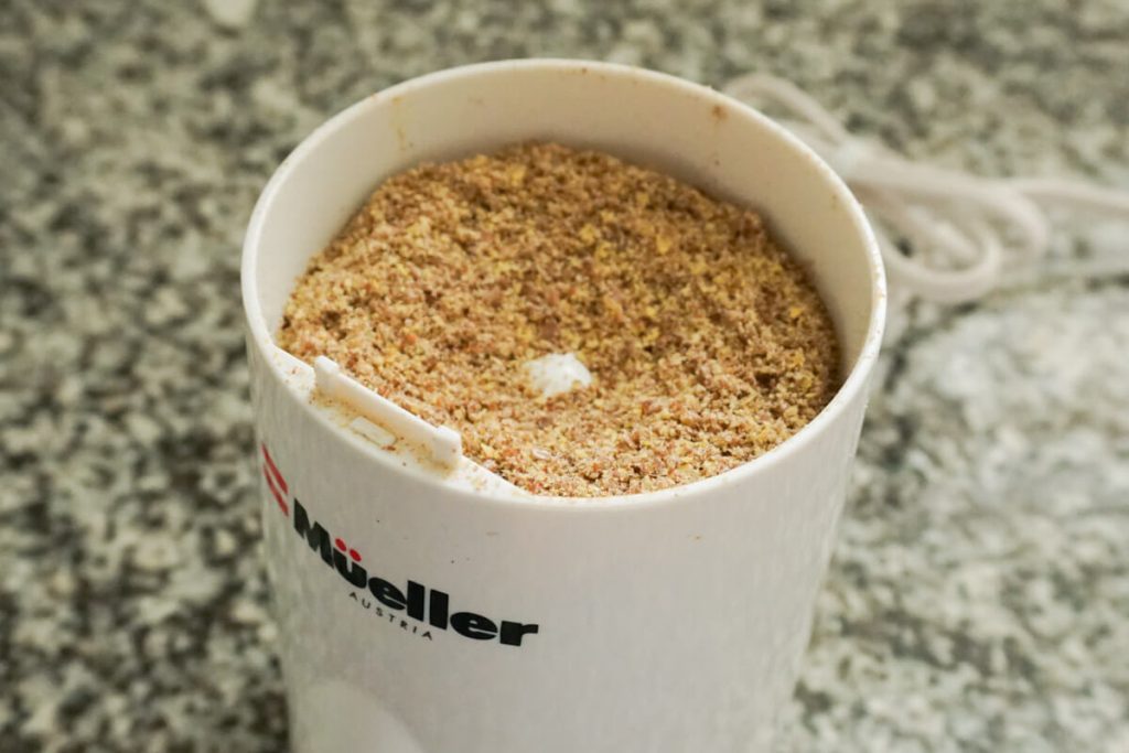 fresh ground flaxseed in a spice grinder