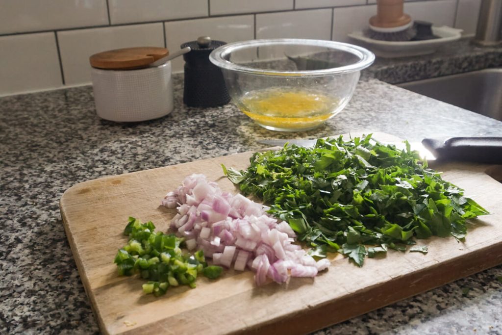 Finely chopped herbs for homemade chimichurri sauce