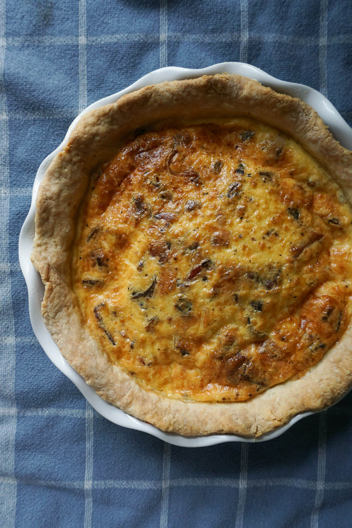Baked cheese and bacon quiche with homemade crust