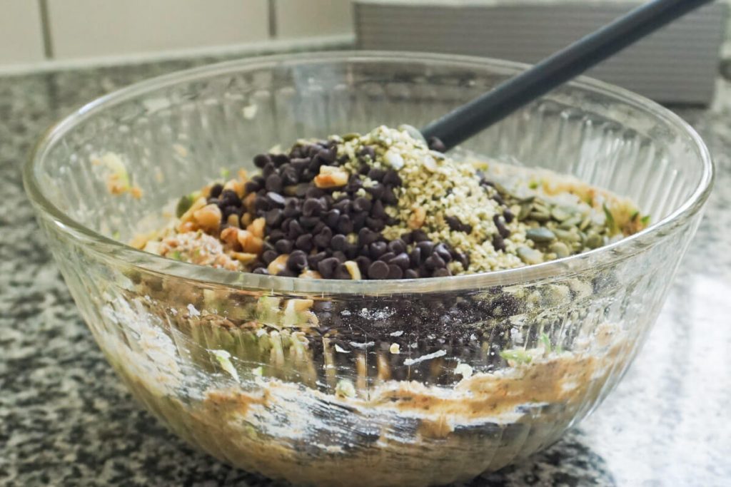 adding high fiber ingredients and chocolate chips to healthy chocolate chip breakfast zucchini bread
