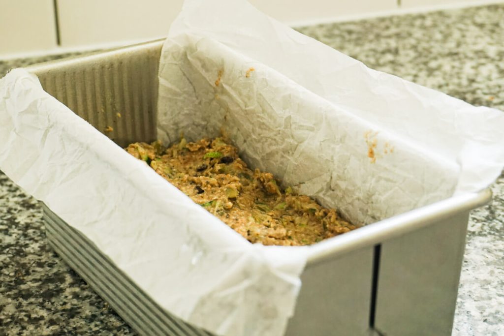 breakfast zucchini bread batter in loaf pan